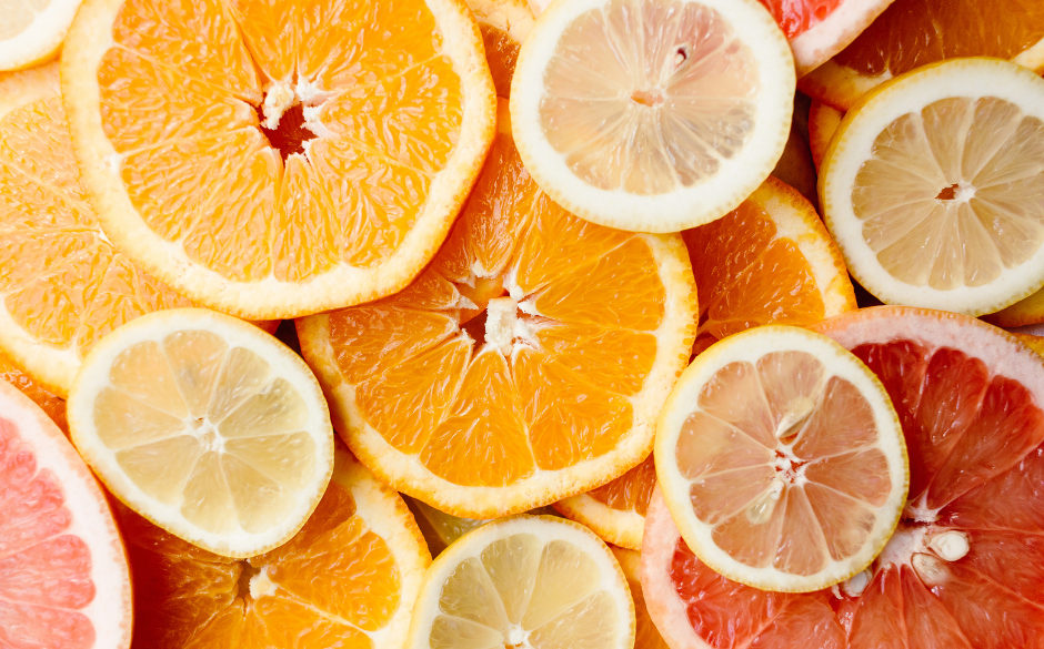 A close up of sliced oranges and grapefruit